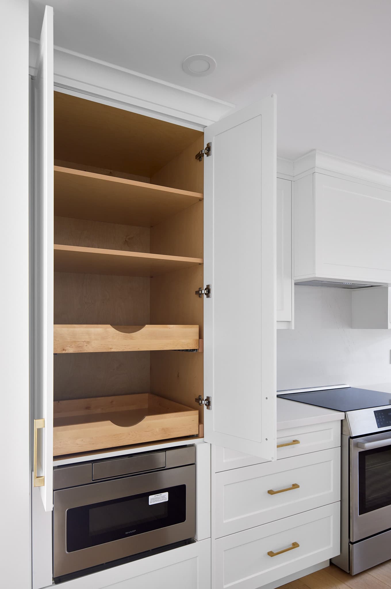 Kitchen storage and millwork by Harbour Kitchens