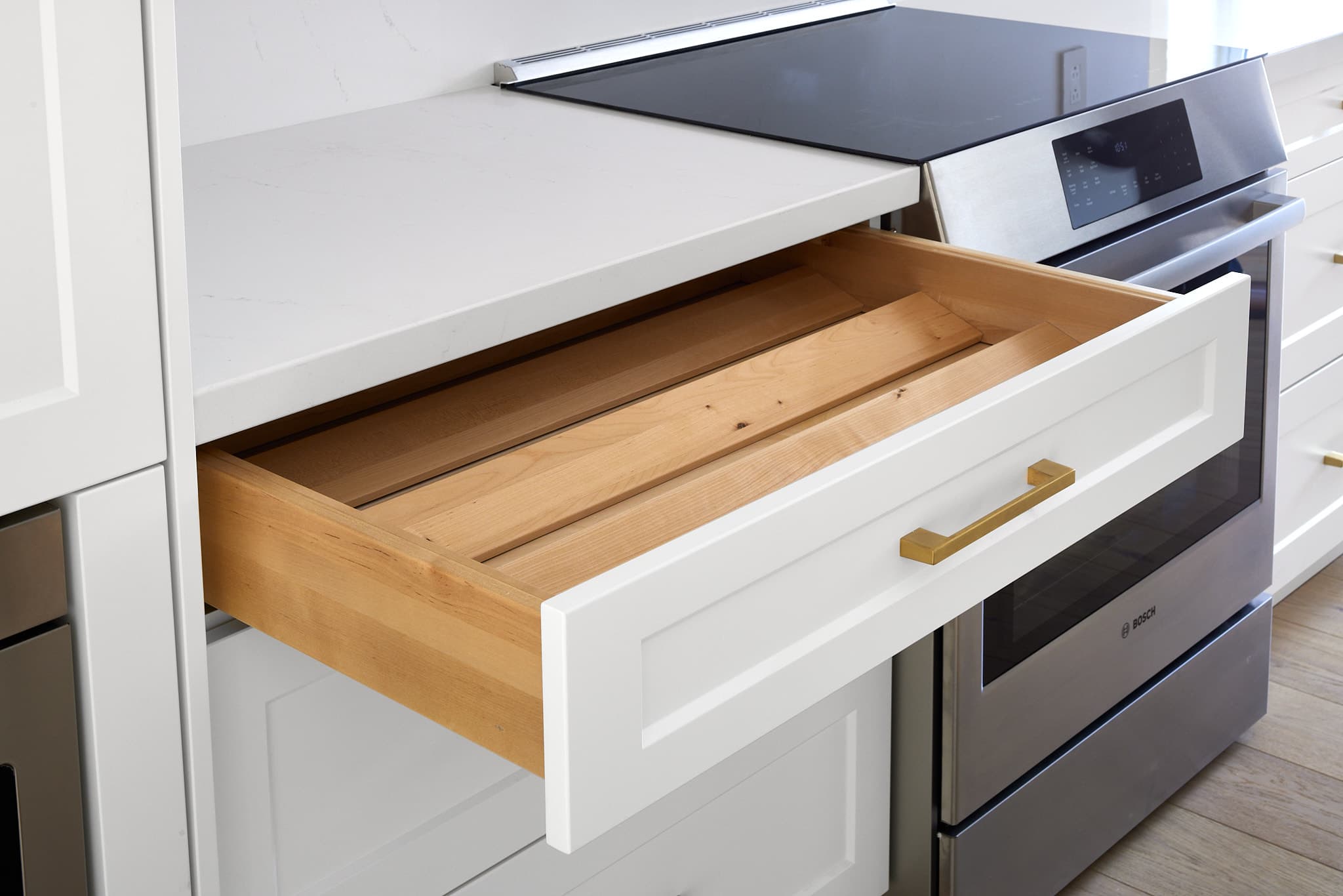 Kitchen cabinetry and countertops by Harbour Kitchens