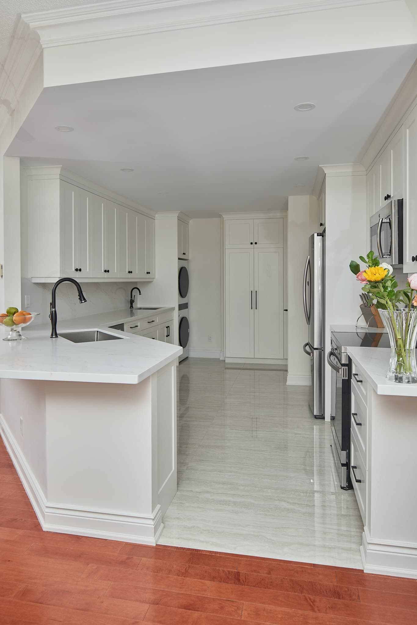 Kitchen cabinetry and island by Harbour Kitchens