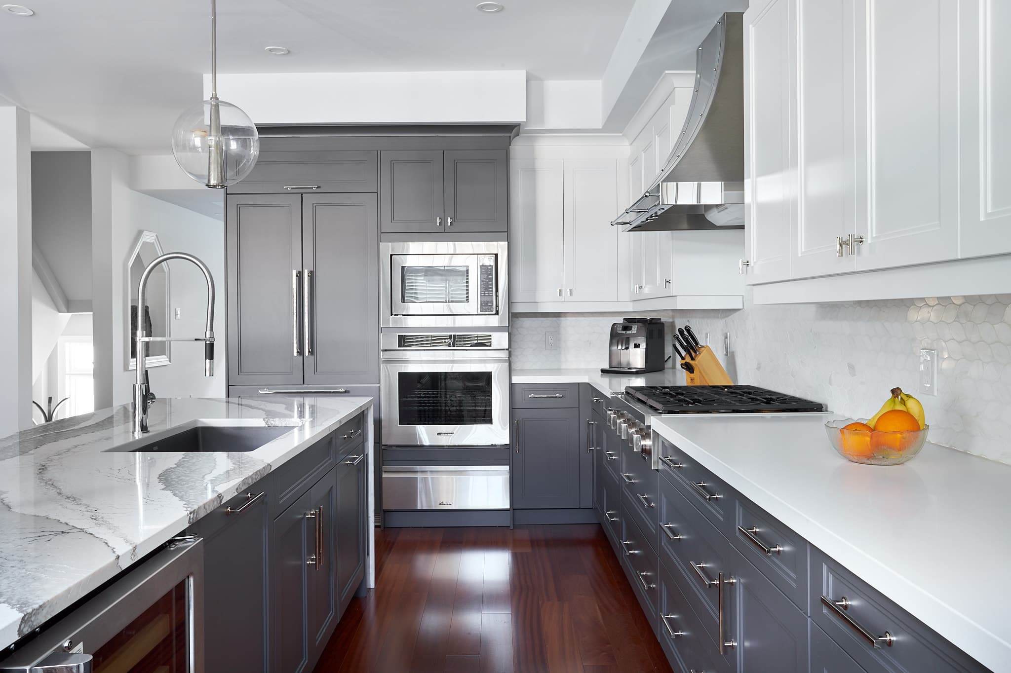 Kitchen lighting and cabinetry by Harbour Kitchens