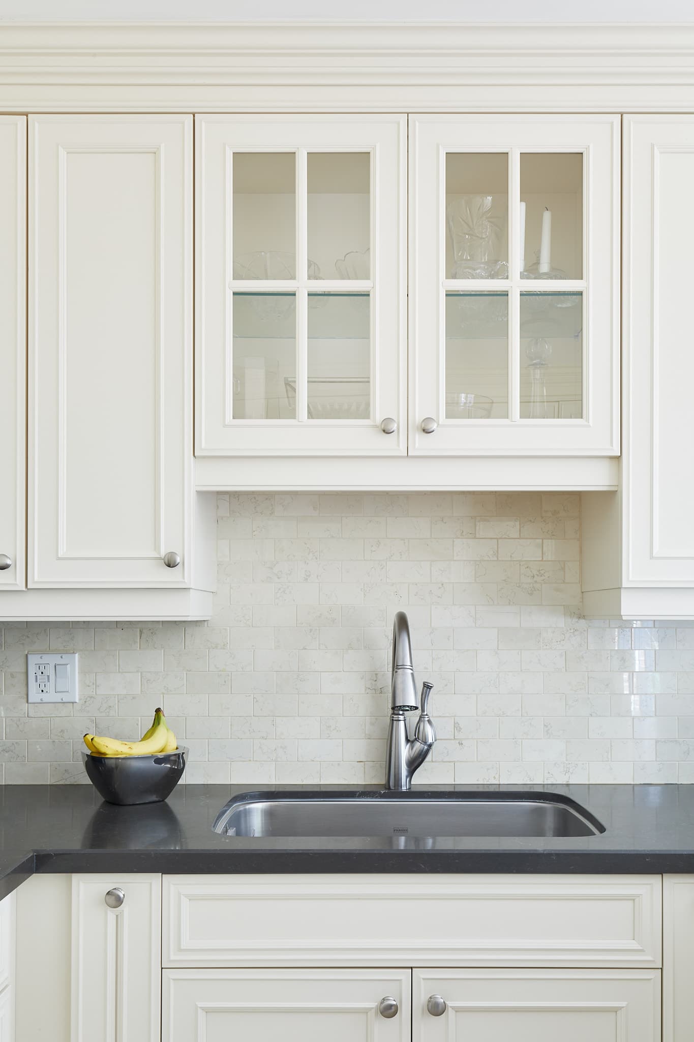 Custom kitchen with stone countertops by Harbour Kitchens