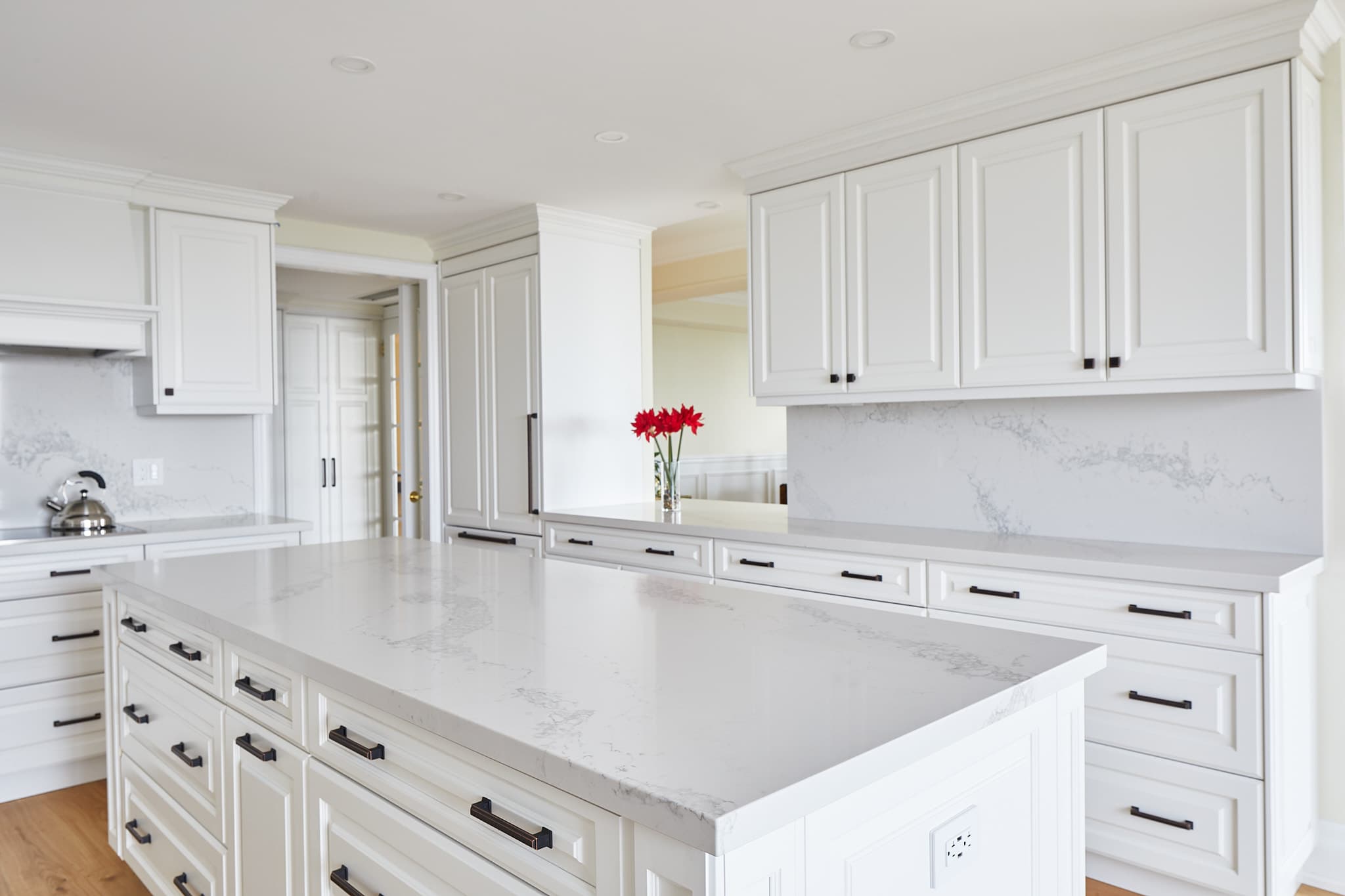 Open-plan kitchen by Harbour Kitchens